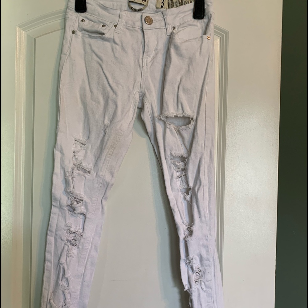 White holey jeans